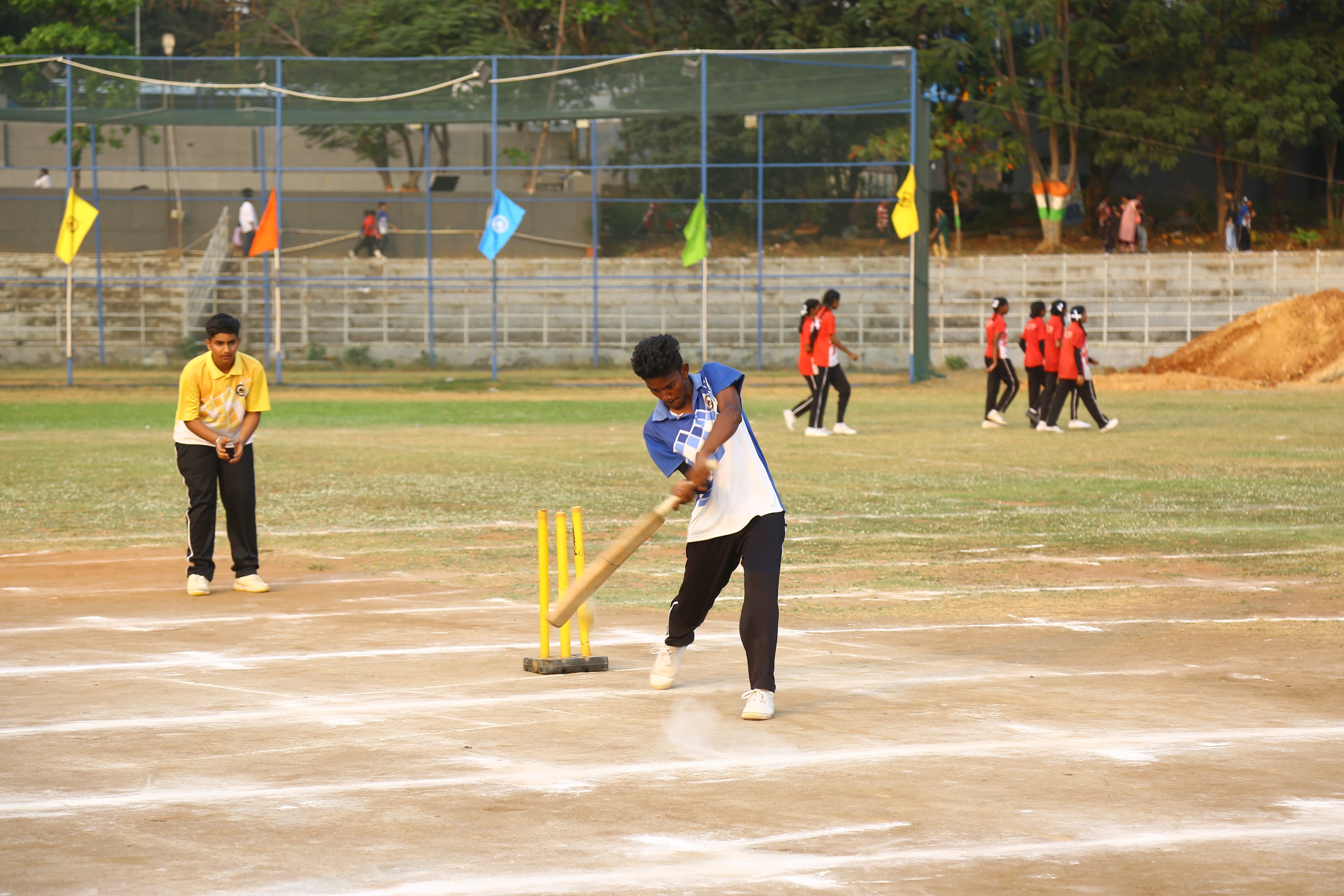 Students competing in a field event